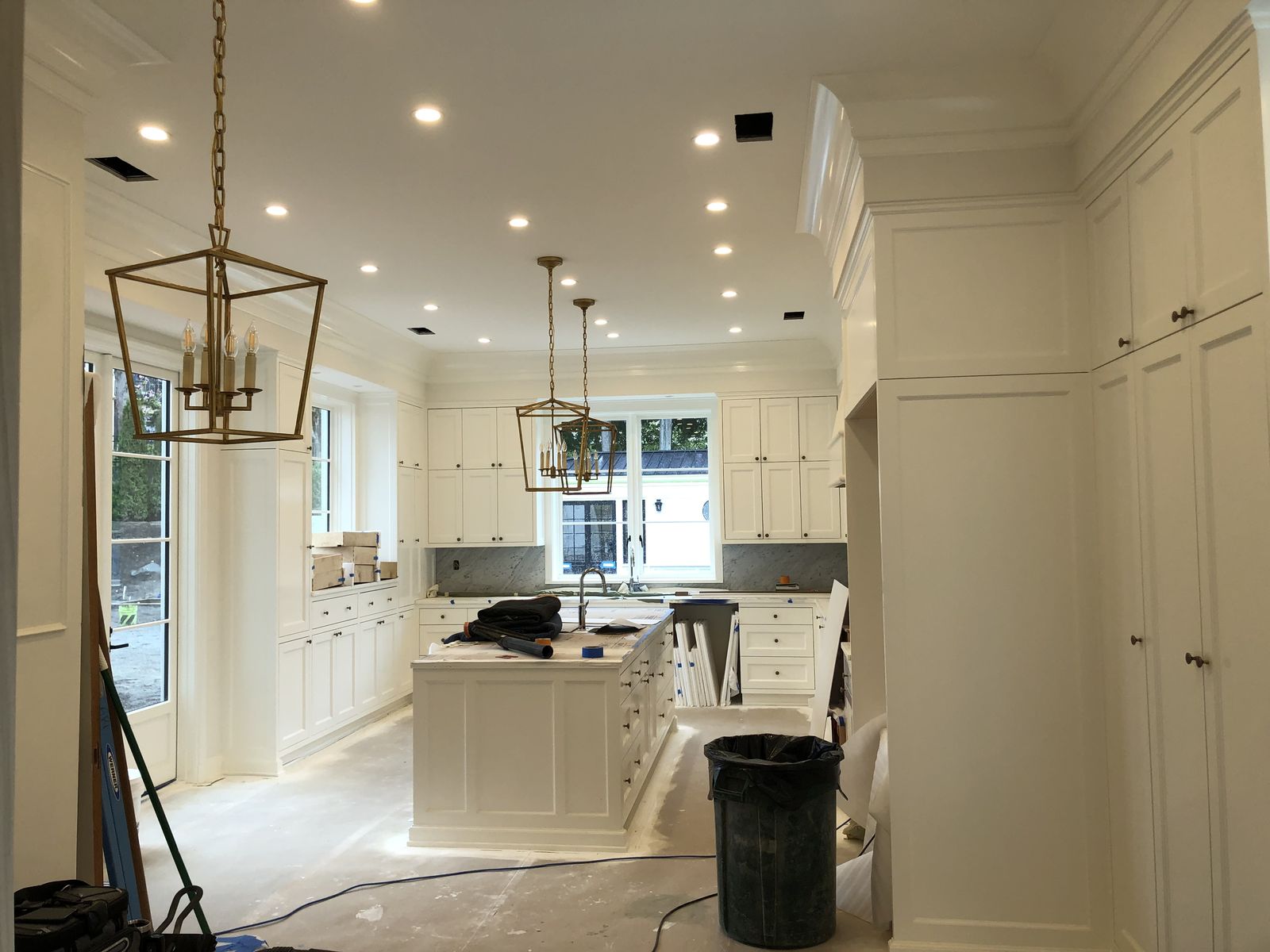White painted kitchen cabinets by GTH Painting
